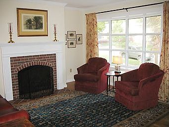 Large bay window overlooks dogwood trees