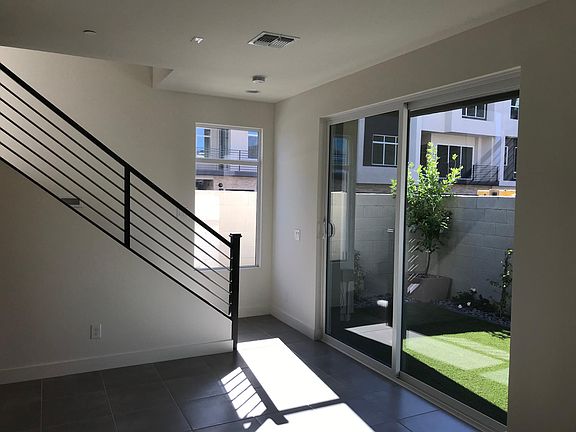 First Floor - Bonus Room Well lit with views of the well manicured backyard.