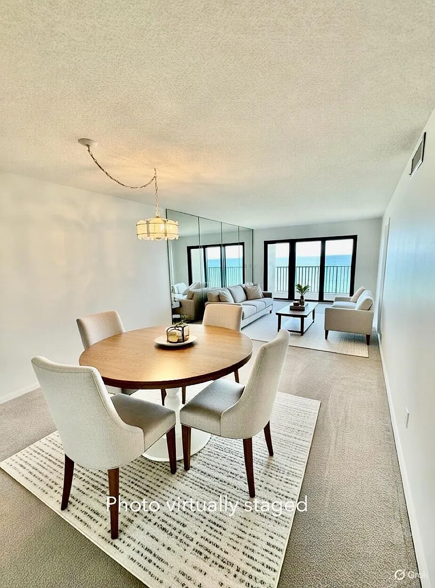 Building Photo - 10044 S Ocean Dr #1004