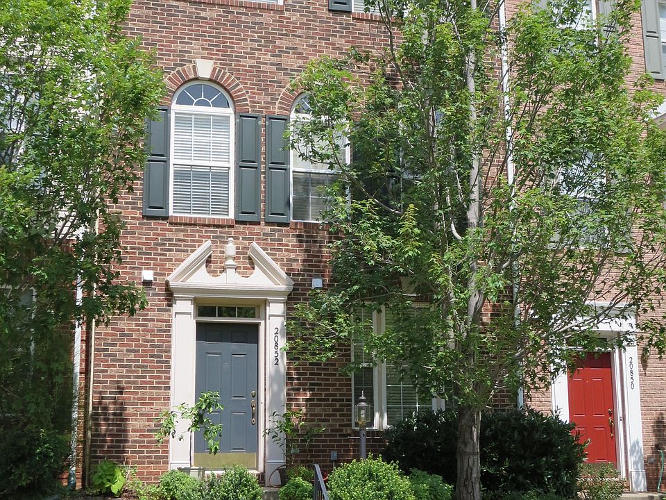 Front with open parking spaces