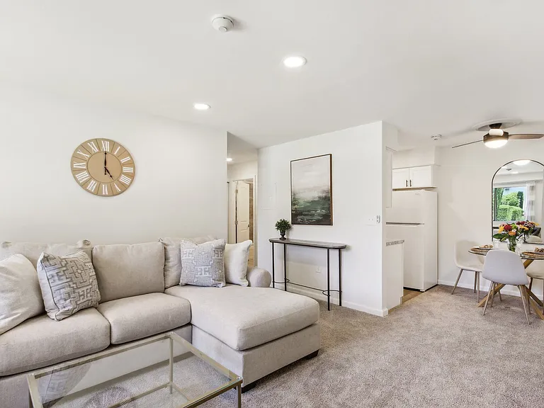a living room with a couch and a coffee table