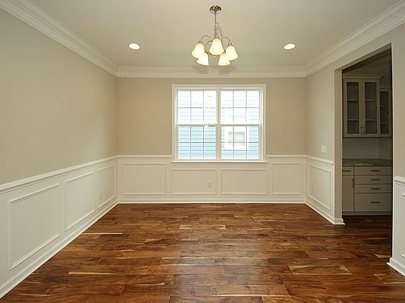 Photos are of a similar home