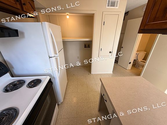 Kitchen angle 4 with washer and dryer hook ups