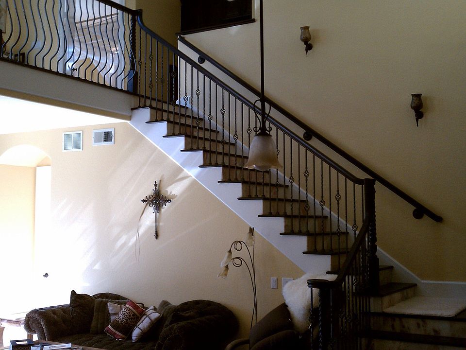 Custom Trimcraft Cherry and marble staircase