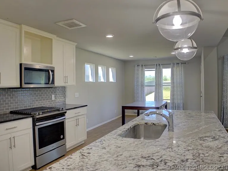 7012 S Elder Ave — Photo 12