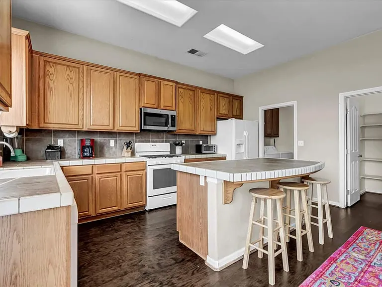 kitchen with seating for 3