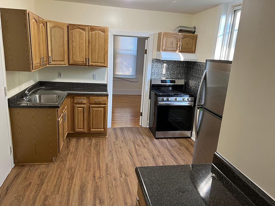 Newly renovated kitchen with gas stove.