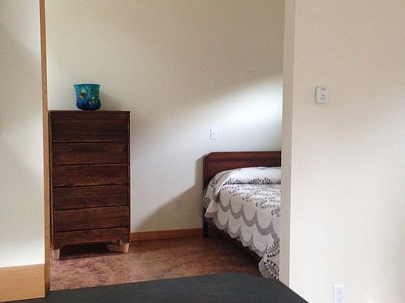 A look toward the bedroom from kitchen/living area