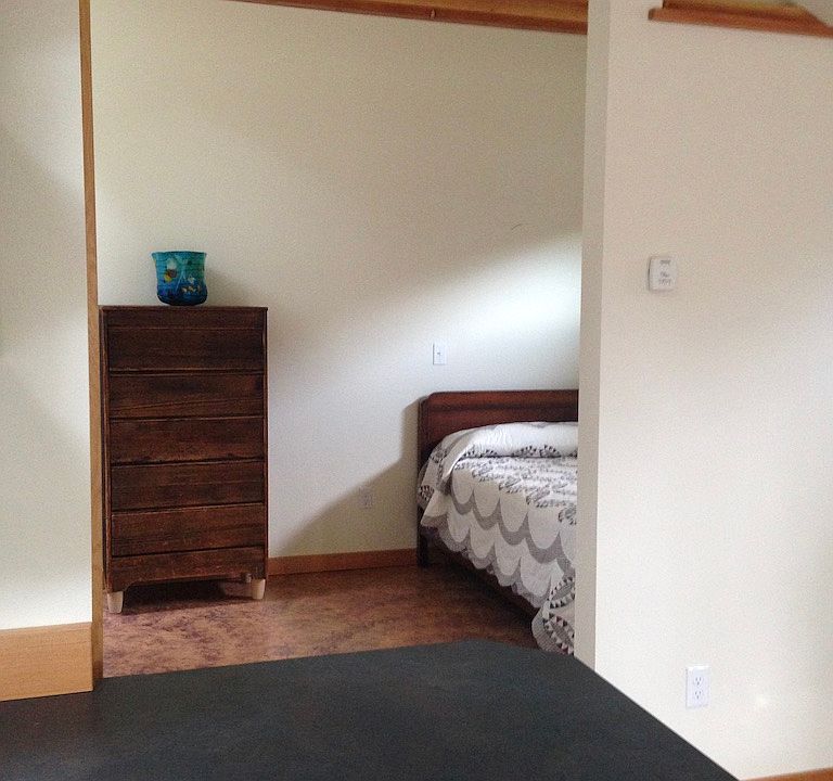 A look toward the bedroom from kitchen/living area