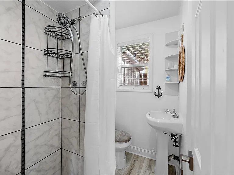 Bathroom downstairs with just a shower