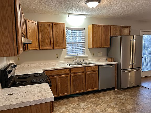 The kitchen provides Stainless Steel appliances and plenty of cabinet and countertop space
