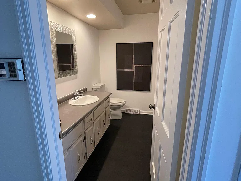 Half bath near the kitchen and dining room