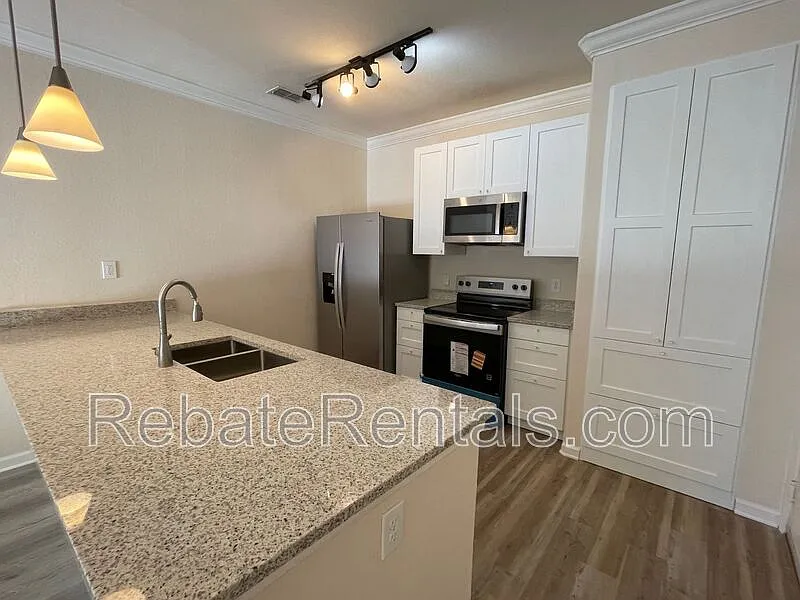 Building Photo - 8290 Gate Pkwy W #1314