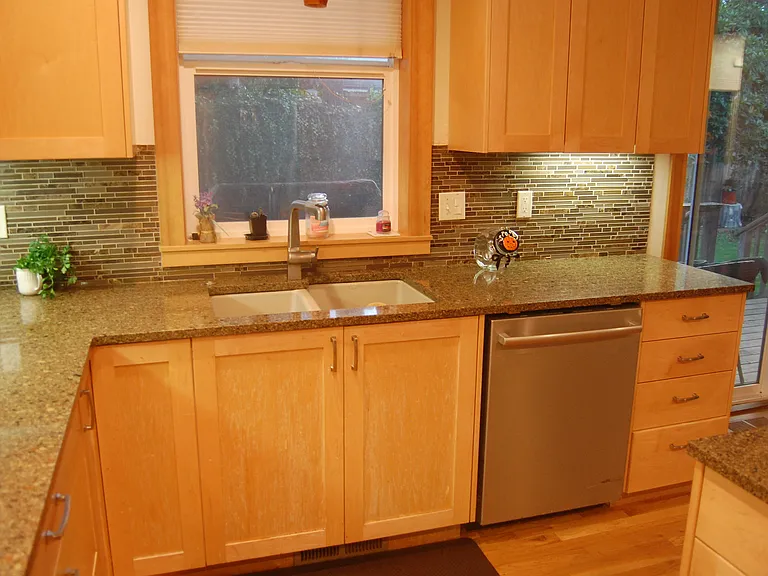 Bosch Dishwasher and Kohler Sink and Faucet.