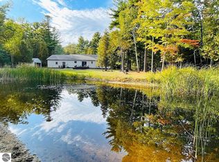 4165 Juniper Dr, Kewadin, MI 49648