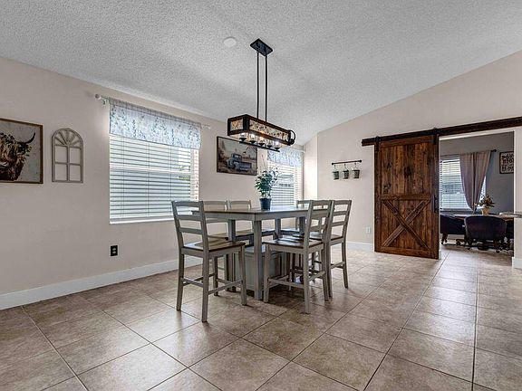 5th image of 7925 Ambleside Way