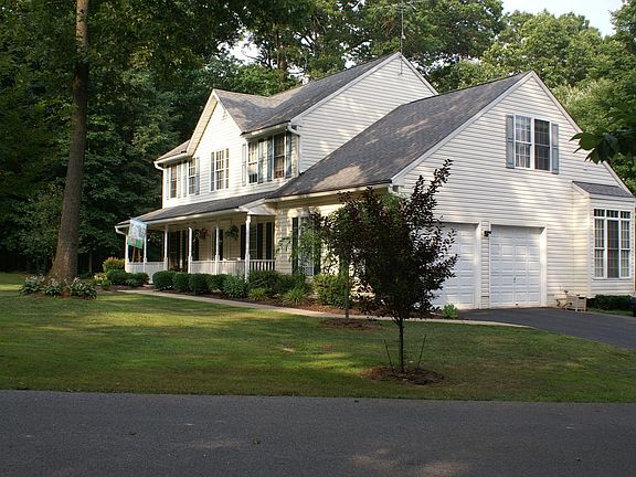 Two Car Garage and new 3 car parking pad