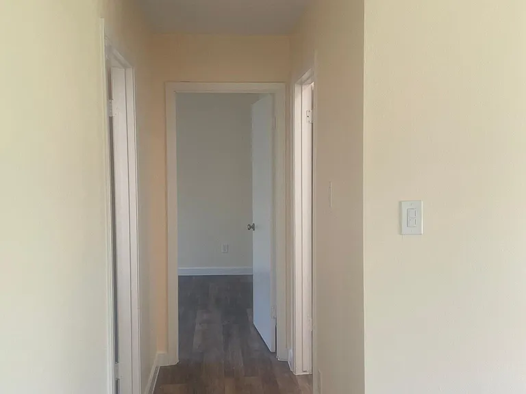 Hallway to bedroom 1 & master bedroom