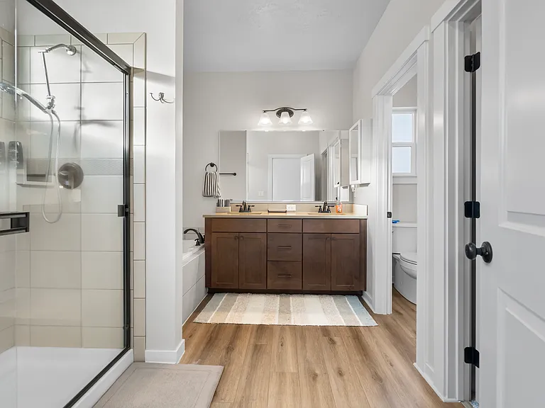 Main Bath with separate shower and bathtub