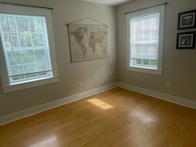 1st Bedroom with two small closets. 10x10 lots of natural light