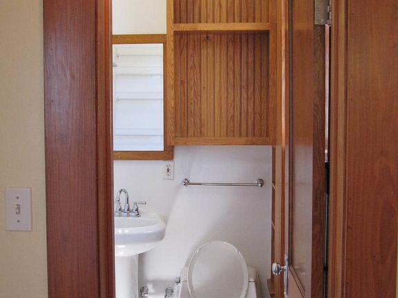 Custom bath with modern appliances and antique footed tub/sh