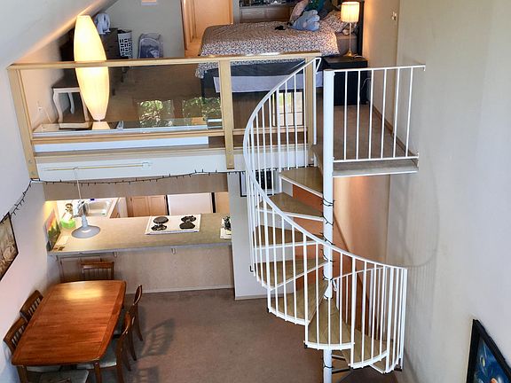 Kitchen dining area below, Loft with wet bar fridge, bathro