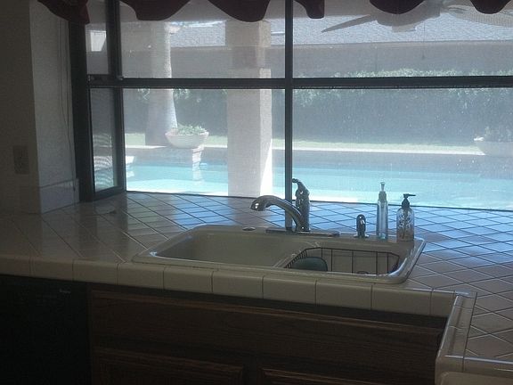 kitchen overlooks pool