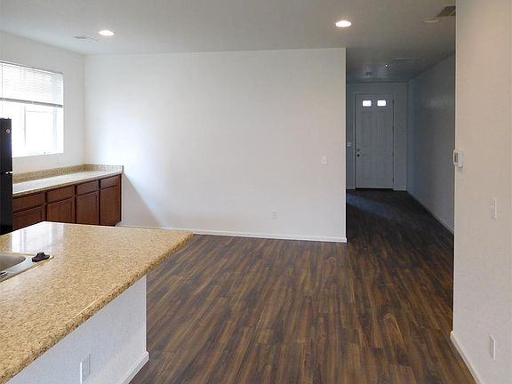 Located down the main hall are 2 spacious, immaculate Bedrooms and a full Bathroom.