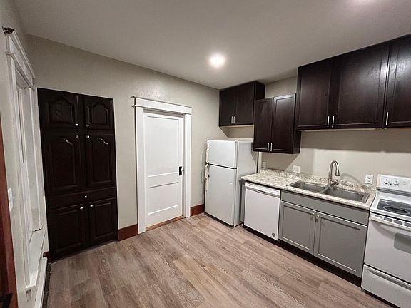 Kitchen with bedroom door