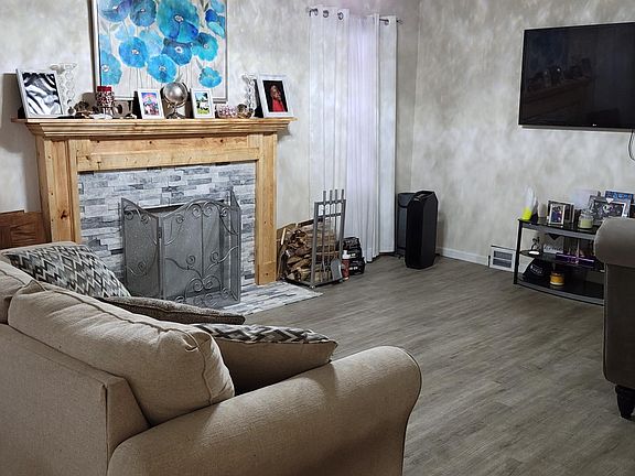 Living room. Chaise lounge chair not included in furnishings.