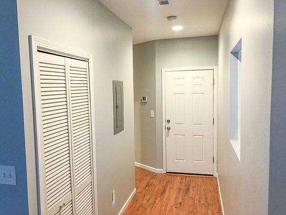 Hallway to bathroom and bedrooms