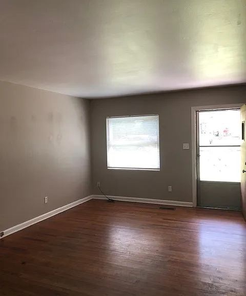living room with hard wood floors