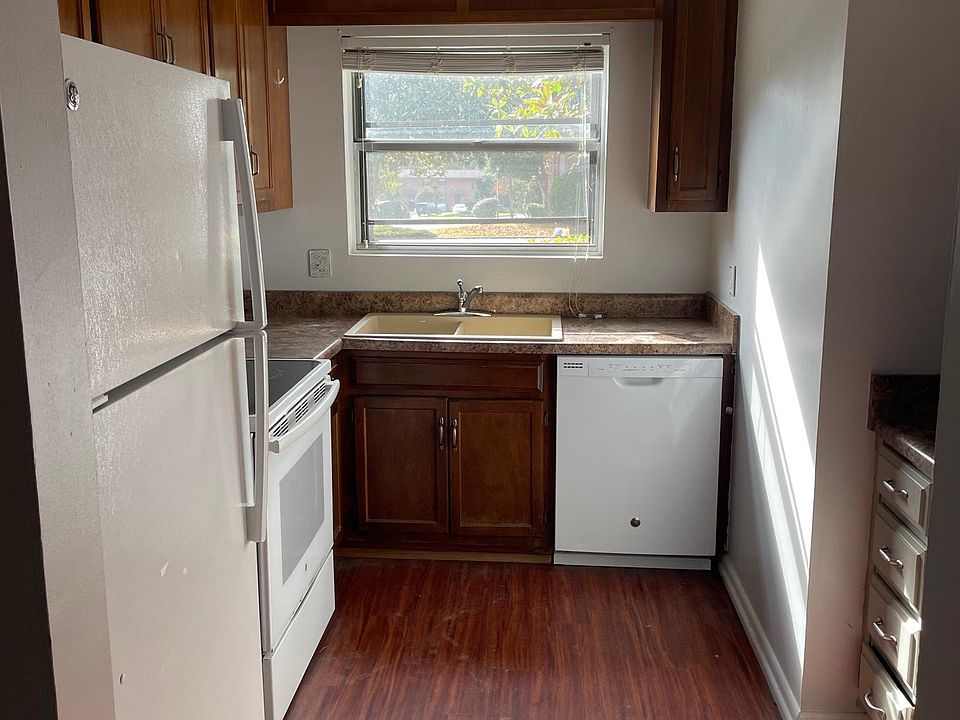 Lots of Kitchen cabinets with all appliances,