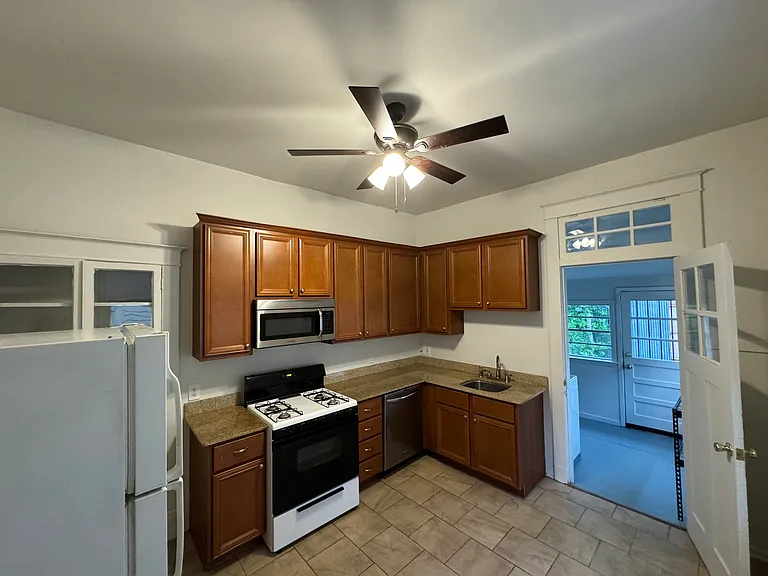 Kitchen next to Utility Room, Laundry and Storage