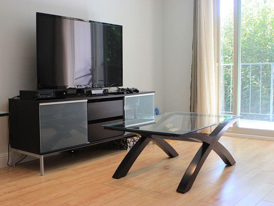 sitting area in reception (furniture shown provided )with patio