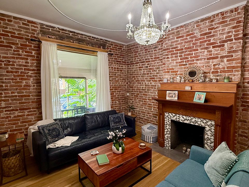 Modern and historic, all refinished hardwoods, and an orginal restored chandelier.
