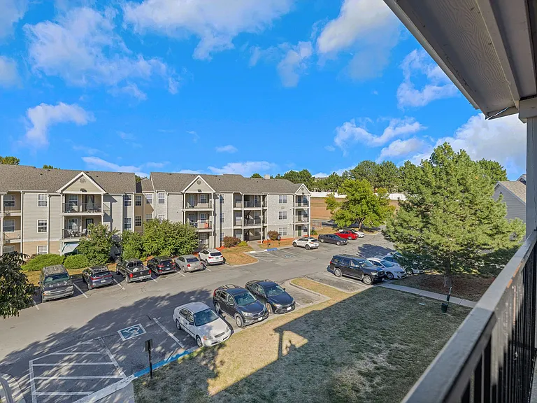 Ample parking and beautiful surroundings at Cambury Hills Apartments, 16255 Emmet Plaza, Omaha, NE 68116. Professionally Operated by Highlands Vista Group.