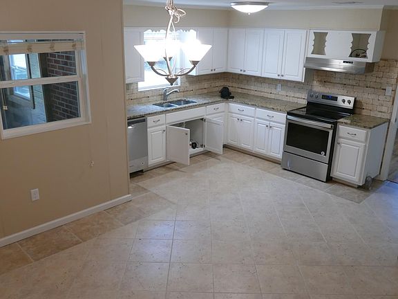 Large eat in kitchen. Doorway on right leads into formal din
