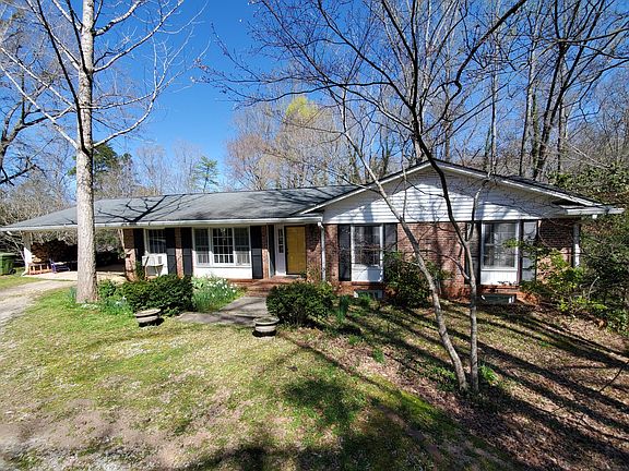 Front view of house as you pull in the driveway
