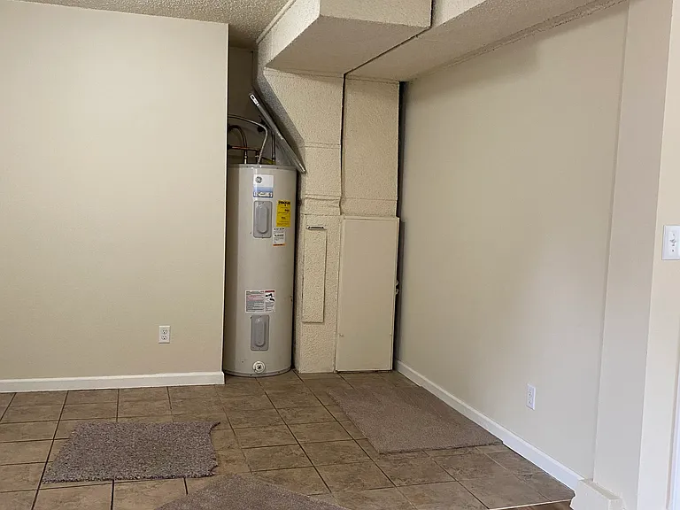 Tile in entry way and LVP in large family room downstairs.