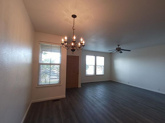 Living and dining room from kitchen breakfast bar