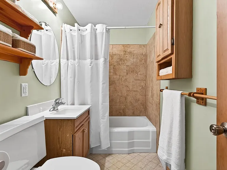 This bathroom will have a new vanity and flooring. New photos to come.