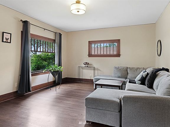 Living room has plenty of space for conversations.