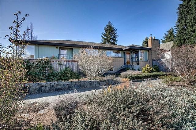 Inviting entrance to home on the right side with ample street parking in front.
