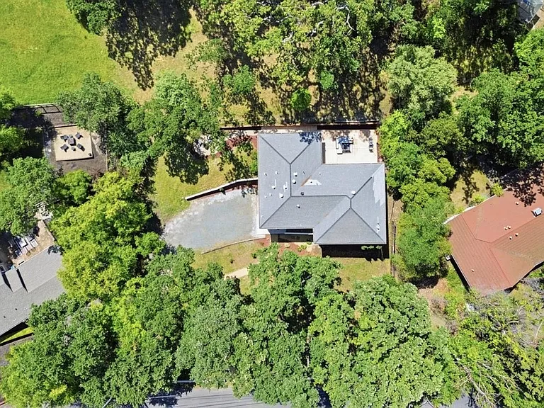 Private wooded setting on an expansive Walnut Creek lot