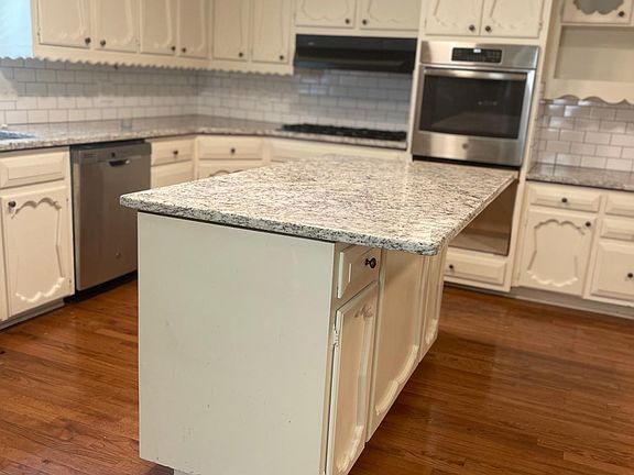 kitchen with new stainless appliances no