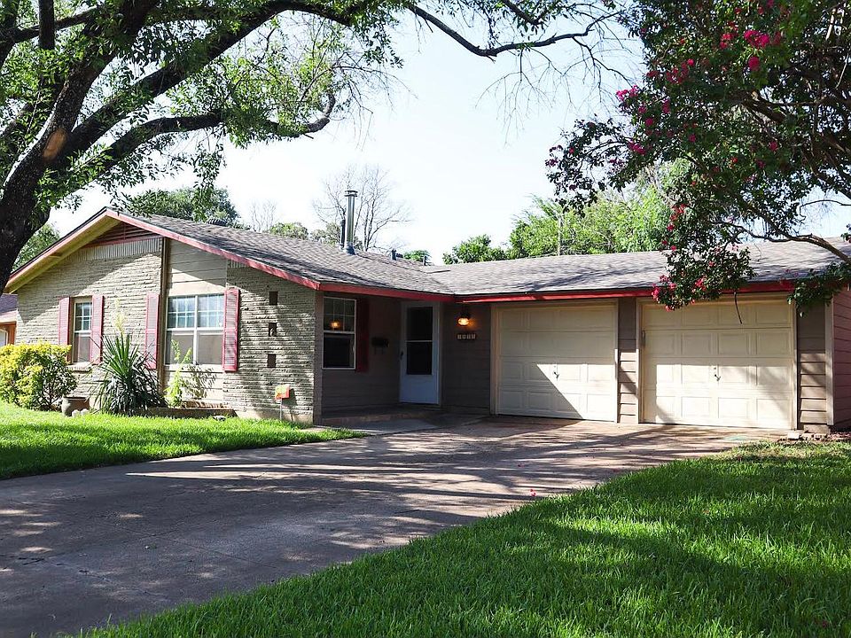 Front of House. Two car garage (one small vehicle and one full size)