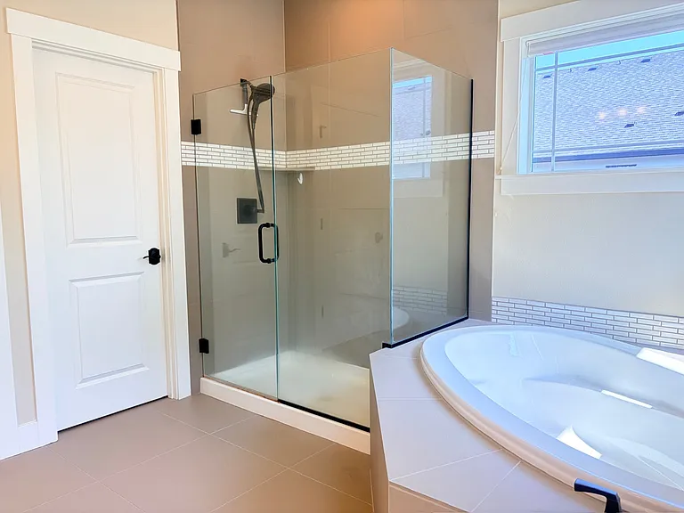 Spacious master bathroom with bathtub
