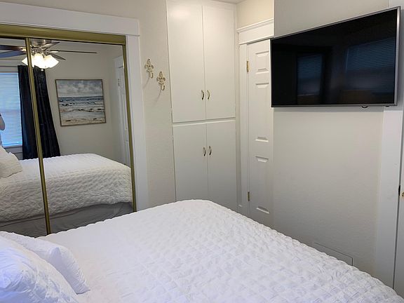 bedroom with extra deep linen closets