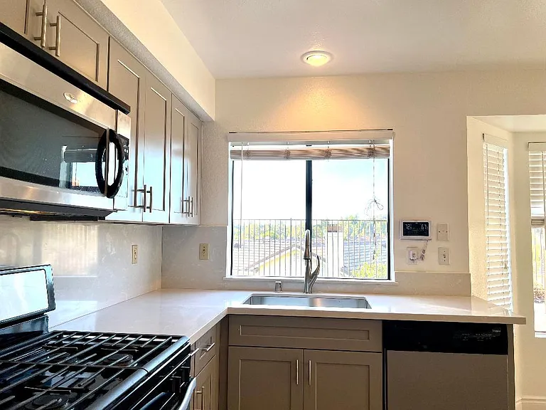 New sink, faucet, cabinets, counter tops.